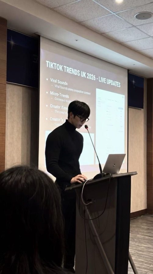 Jia Jingqiu speaking at a TikTok trends presentation